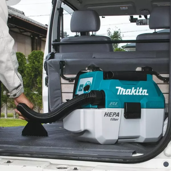 Makita 18V LXT Brushless 4-1/2 in./5 in. Angle Grinder, 1/2 in. Impact Wrench and 2 Gal. Vacuum with bonus 18V LXT Starter Pack